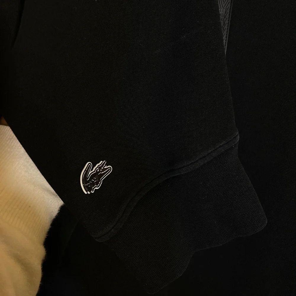 Lacoste sleek black